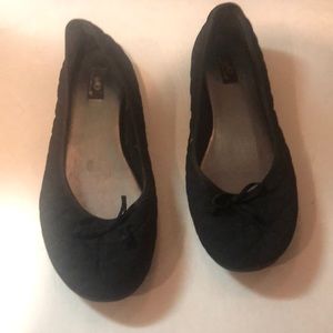 Black quilted flats with a bow in front . Size 9.